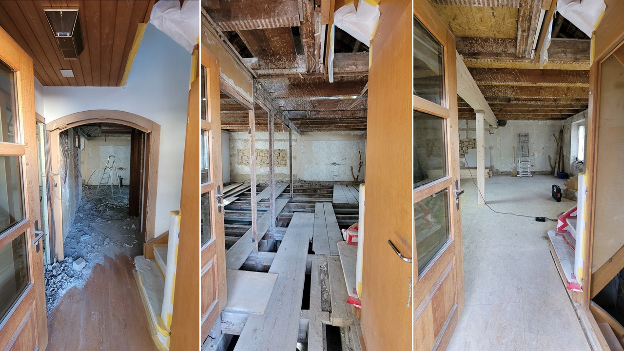 Innenausbau mit neuen Holzbalken und Wänden während der Sanierung